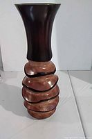 Full view of the carved wooden vase