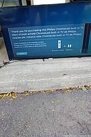 Front view of Philips TV displaying Chromecast setup screen