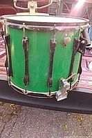 Full view of green Ludwig Classic drum on truck bed