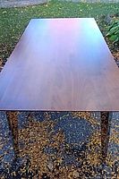 Full view of tabletop surface showing wood grain and overall size