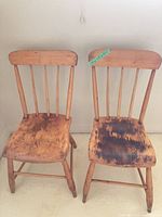 Front view of both wooden spindle back chairs