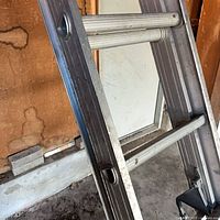 Close view of ladder side rail and rungs