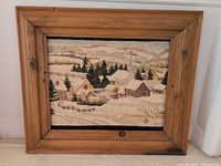 Full view of hooked rug artwork in pine frame