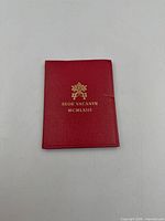 Red presentation sleeve front stamped SEDE VACANTE MCMLXIII