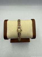 Front view of Bulova ladies wristwatch on display cushion