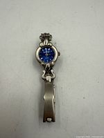 Full view of Carl Ange stainless steel quartz wristwatch showing blue dial and bracelet segment