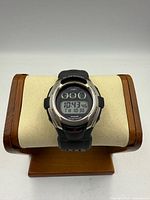 Front view of Casio G-Shock watch on display stand, time displayed