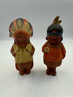 Both ceramic figurines front view