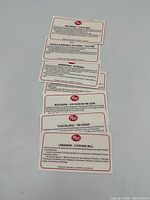 Six stacked Post information cards showing currency details for Indonesia, China, Argentina, Bulgaria, Yugoslavia, Lebanon
