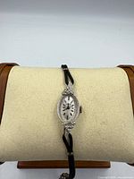 Front view of Longines ladies watch on display cushion