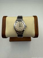 Front view of Liban wristwatch on display cushion
