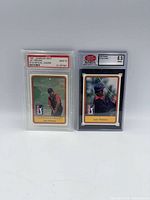 Front view of both graded Lee Trevino 1981 Donruss golf cards in slabs