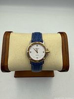 Front view of Raymond Weil Parsifal watch on stand showing dial and bezel