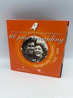 Closed folder front showing title and photo