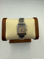 Front view showing entire watch on display pillow