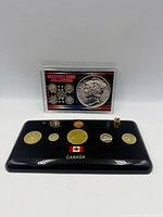 Front view showing both coin sets