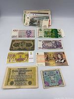 Overall view of laid-out notes and stacked group