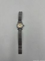 Front view of Oyster Raleigh watch showing dial and stretch bracelet