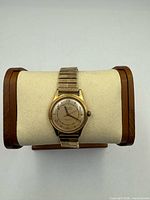 Front view of Sylvan wristwatch on display pillow