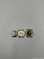 Front view of three watch heads side by side