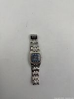 Front view of Omega Constellation watch showing blue dial and bracelet