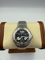 Front view of Tissot chronograph watch on display cushion