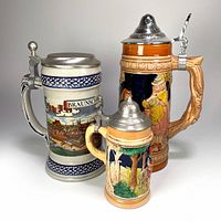 All three lidded beer steins front view