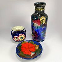 Group shot of all three blue floral ceramic items