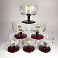 Six Luminarc ruby stem coupes stacked in pyramid formation