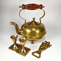 All items together showing kettle, two candle holders and bottle opener