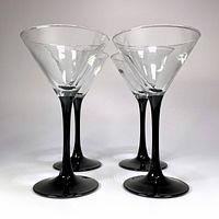 Four Arcoroc martini glasses front view