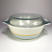 Side view showing dish with lid and pattern