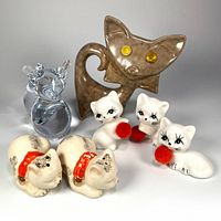 All seven figurines grouped