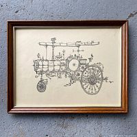 Full view of framed ink drawing under glass