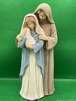 Front view of Holy Family figurine showing full height and colors