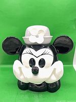 Front view of black and white Minnie Mouse cookie jar