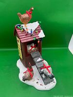 Full view front of chicken coop figurine with hens, lights, snow