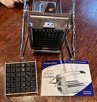 potato cutter front view with blade grid and leaflet