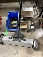 Rolling magnet with totes of nails
