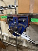 Front view showing blue cast-iron face, handle and markings