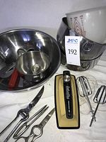 Group shot of mixer, bowls, utensils