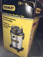 Box showing Stanley stainless steel wet/dry vac with 2.8 peak HP rating