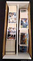 Top view of long box filled with two columns of baseball cards