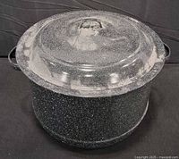 Pot with lid, front view