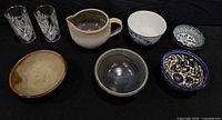 Group of all items showing two etched glasses, pitcher, five bowls