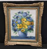 front view of framed floral painting