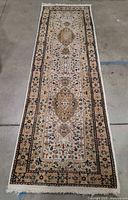 Full view of hand-tufted runner rug on floor