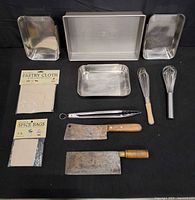 overview of all pans, utensils, packaged items