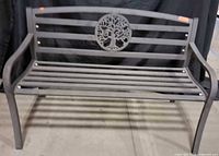 front view of metal bench showing Tree of Life back insert