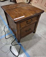 Wooden two drawer file cabinet with built in power and phone ports